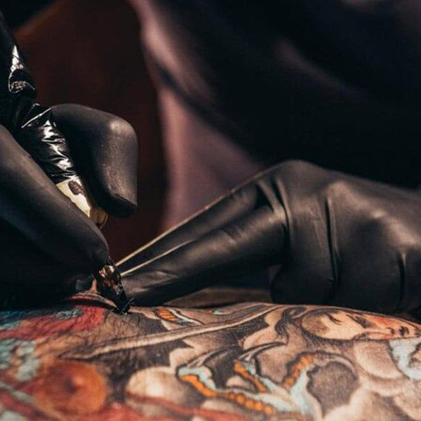 Understanding the Usage of Black Disposable Gloves in Tattoo Artistry