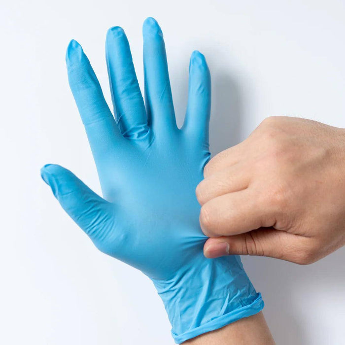 Hands Wearing MG-G24 GP Craft 4.4 MIL Blue Nitrile Exam Gloves