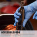 Person wearing blue gloves using tongs to handle food with text about accessible food temperature guidelines.