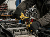 Mechanic working on a car engine with tools in a garage setting wearing Tuff Gard Deerskin Mechanic Glove – Hi‑Viz Yellow & Black | Vizocare