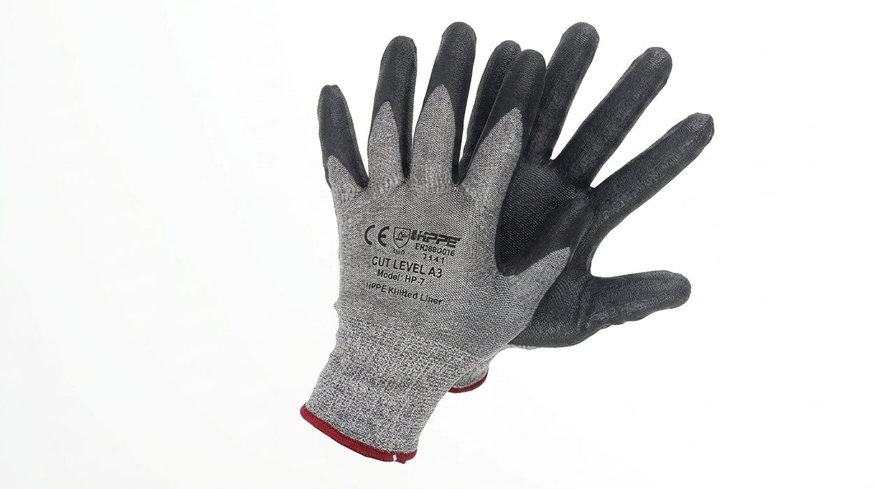 Pair of gray and black gloves  on a white background